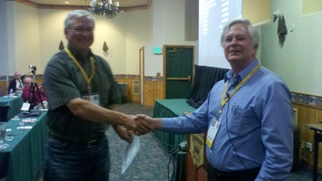 Richard Sabo receives his observer award.